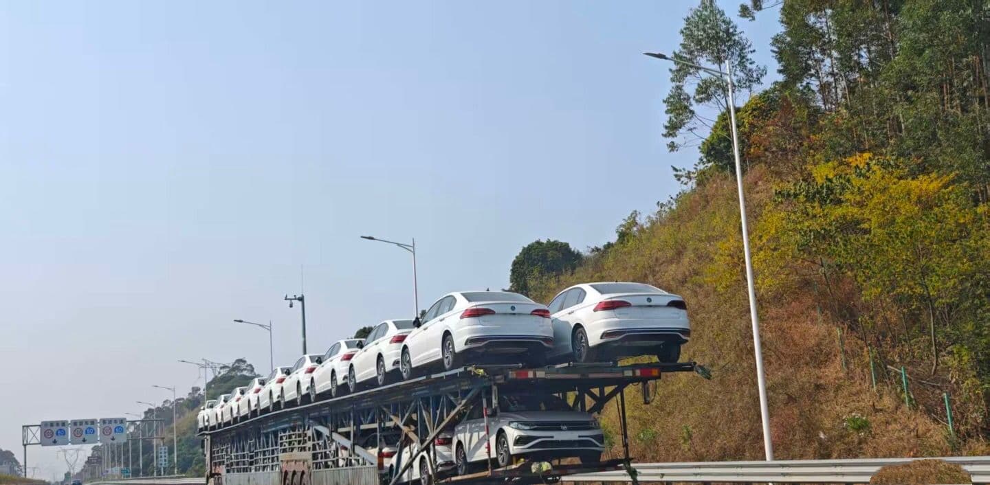 Car carrier on the highway to the port